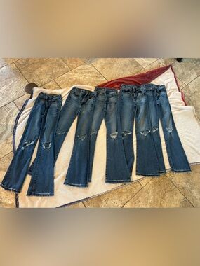 5 )American Eagle Dark Blue Distressed Women’s Jeans - Classic Flare